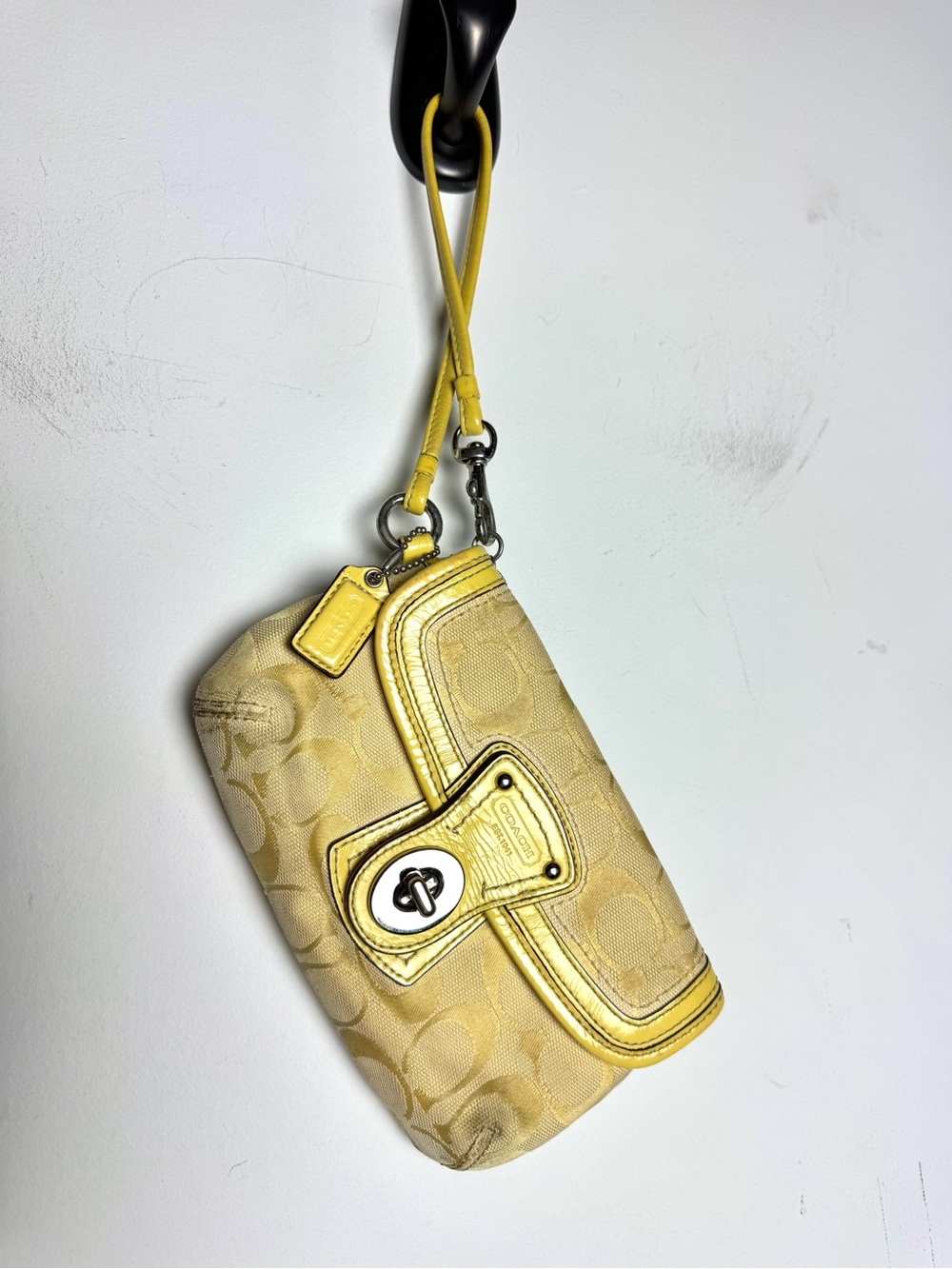 COACH Legacy Signature Yellow Turnlock Wristlet